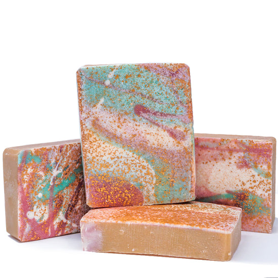 Load image into Gallery viewer, four abstract colorful bar soaps, golden sprinkles, purple and green splatter
