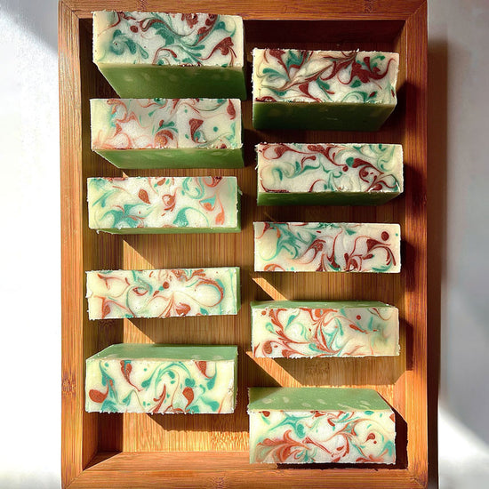10 jasmine green soap bars with swirly top in the bamboo plate box