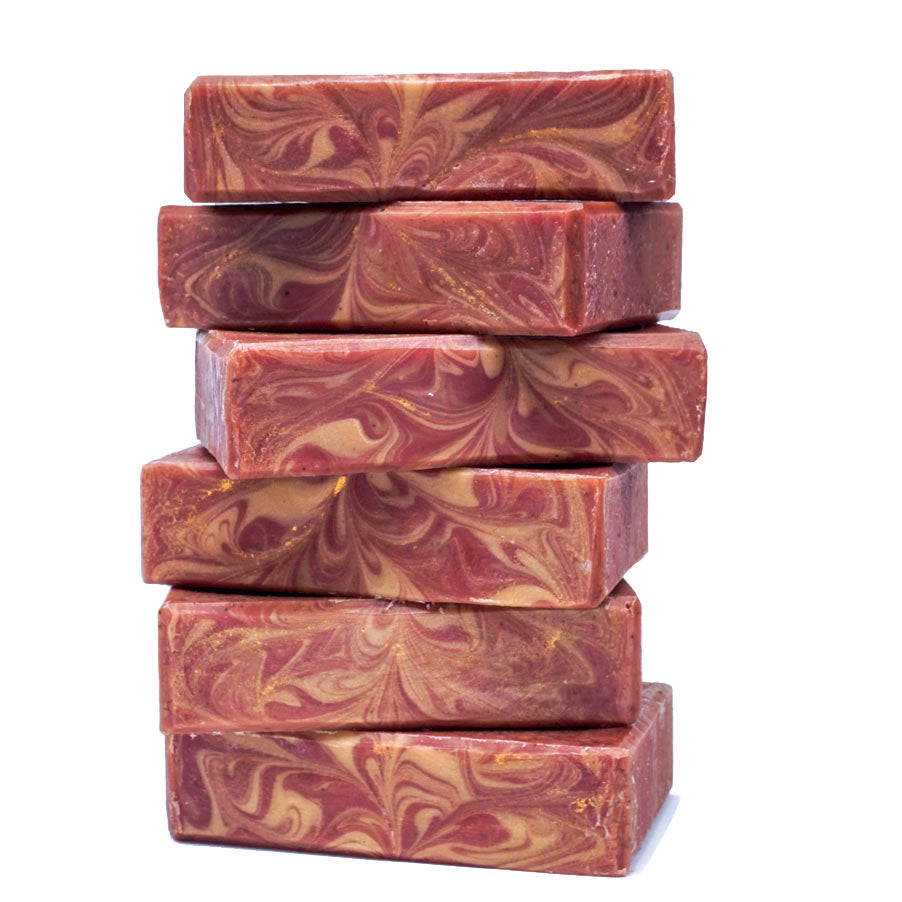 Stack of cinnamon bar soaps with swirly top design